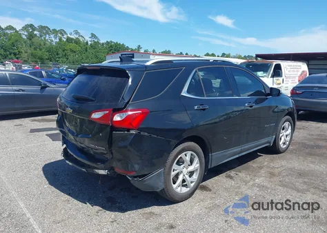 2018 Chevrolet Equinox Premier z USA, uszkodzony, nr VIN 2GNAXVEV7J6318103